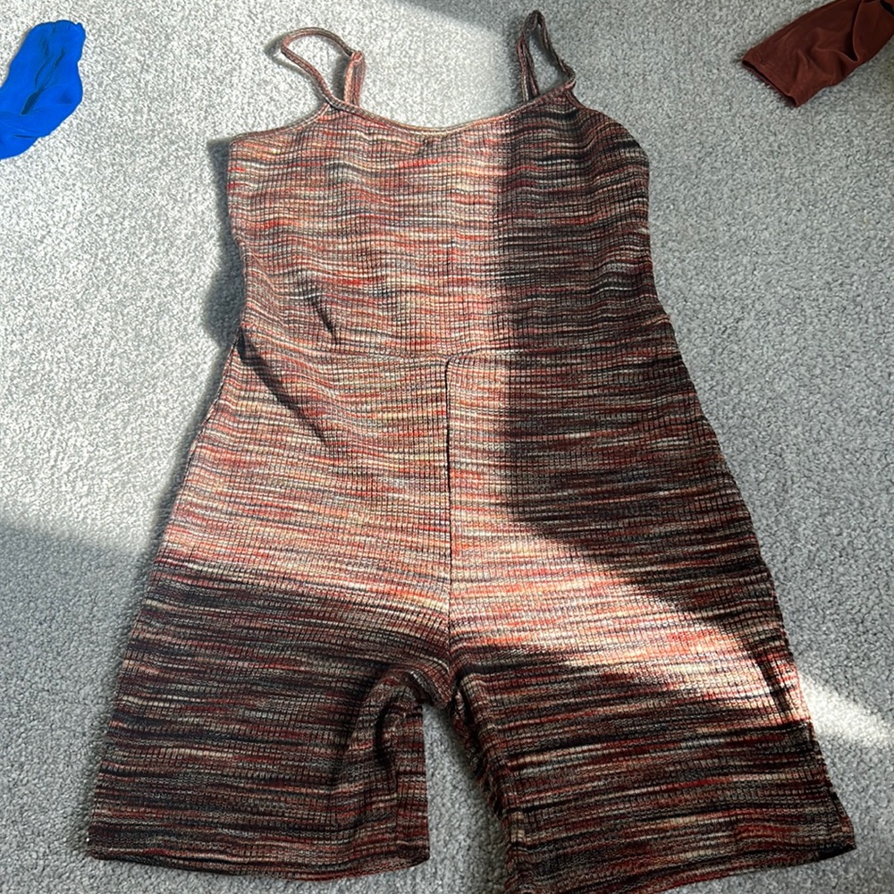 Natural colored romper with adjustable straps